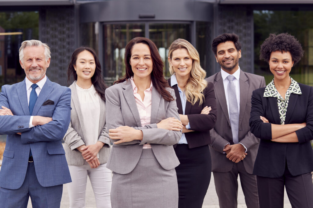 Multi-Cultural Business Team Outside Modern Office Building